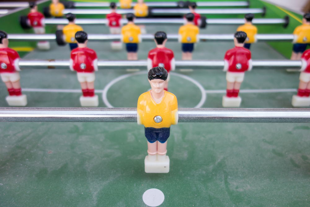 table,football,game,with,yellow,and,red,players